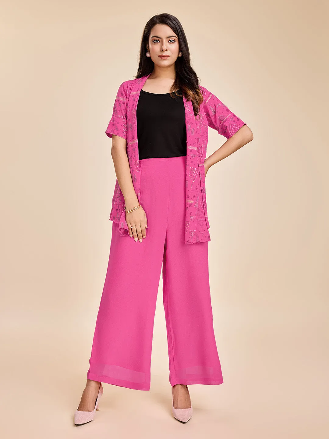 elegant printed short sleeve shrug, a plain comfortable flared pants with smocking at back & a plain black bustier  set in Georgette - Pink