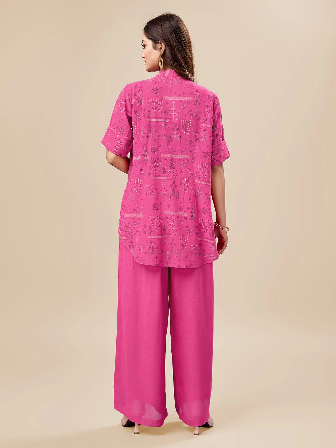 elegant printed short sleeve shrug, a plain comfortable flared pants with smocking at back & a plain black bustier  set in Georgette - Pink