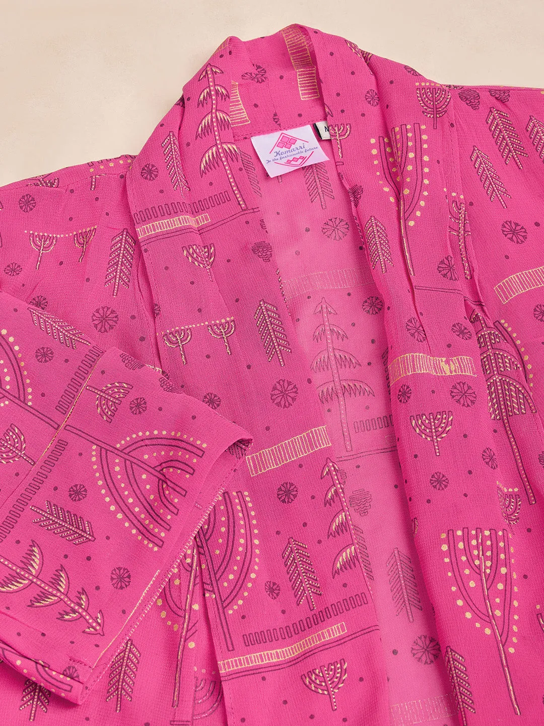 elegant printed short sleeve shrug, a plain comfortable flared pants with smocking at back & a plain black bustier  set in Georgette - Pink